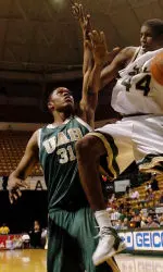 UAB guard Richard Jones defends against South Florida center Solomon Jones. (AP Photo/Steve Nesius)