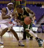 UAB's Donell Taylor, right, drives around Saint Louis' Danny Brown in the second half in St. Louis. Taylor was the high scorer with 27 points as UAB won 64-62. (AP Photo/Bill Boyce)