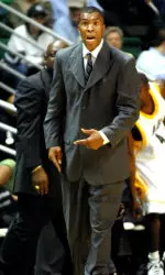 Coach Mike Davis shouts to his players in the first half. (AP Photo)