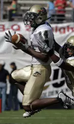 Willie Edwards catches a pass over Central Florida's Johnell Neal in the first half.