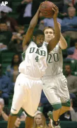 Paul Delaney intercepts a pass meant for Tulane's Andrew Garcia during the first half. (AP Photo/ Birmingham News, Mark Almond)