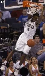 UAB's Paul Delaney (4) scores on a breakaway dunk. (AP Photo)