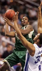 UAB's Brandon Tobias shoots over Kentucky's Randolph Morris during the first half of their NCAA first round college basketball game Friday in Philadelphia. (AP Photo/Tom Mihalek)