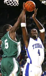 UAB's Frank Holmes defends Tulsa's Calvin Walls.