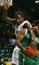 Frank Holmes gets his hand on the ball as Marshall's Tre Whitted tries to hang on to a rebound. (AP Photo/The Birmingham News, Bernard Troncale)