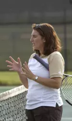 Coach Krissy Hall will hold walk-on tryouts Saturday.