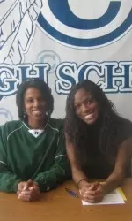 Alexis Bates and her mother after signing the National Letter of Intent to sprint for UAB in 2011.