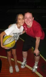 Amanda Peterson and one of the children at the camp in Lodrina.