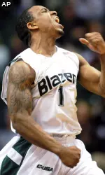 UAB's Aaron Johnson celebrates after scoring and giving UAB a 5-point lead in the final minute.