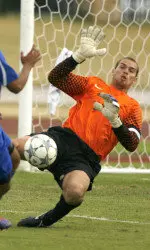 Senior goalkeeper Carl Woszczynski is one of four men's soccer players who were honored by the NSCAA.