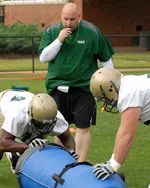 Offensive line coach John Peterson is working with a group that returns only one starter from 2011.