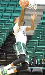 UAB freshman Thaddeus Rideau tries for a layup during practice.