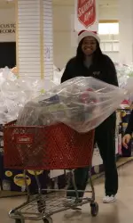 UAB basketball players loaded shopping carts with gifts on Wednesday.