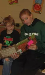 The UAB volleyball team helped out at the "Race to Literacy Event" at Leeds Elementary.