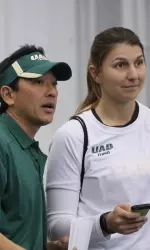 UAB head coach Mark Tjia alongside assistant coach Antonia Nugent.