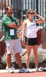 Head coach Kurt Thomas and graduate student pole vaulter Neal Tisher look on at the action at an earlier event this season. Thomas has led his Blazers to a program-high No. 33 in the national polls.