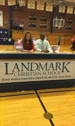 Sylvester Toe signs his NLI with UAB on Wednesday.