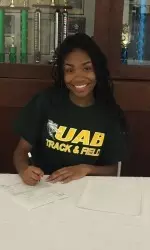 Keila Robertson was the 4A West Montgomery County Region long jump champion in 2014.