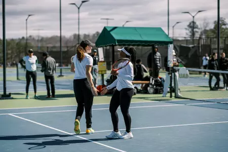 Sydney Clarke and Maggie White on court