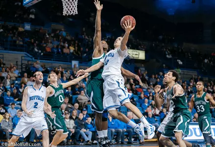 Turnovers Cost Bulls in 65-64 Loss to Manhattan Image