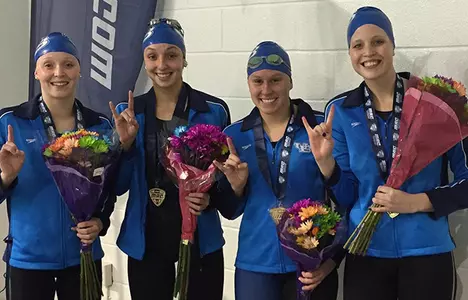 Bulls Win 800 Freestyle Relay, Break School Record at MAC Championships Image