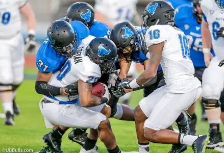 Defense Shines in Blue and White Scrimmage Image