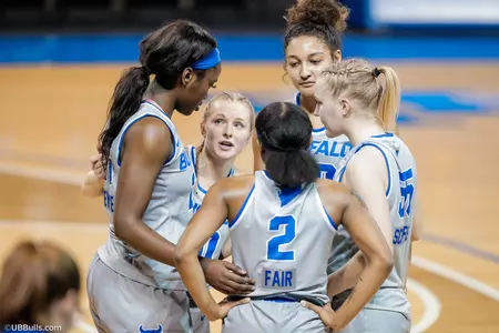 Women's basketball team huddle