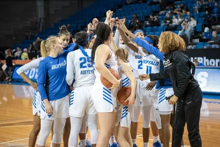 Women's basketball huddle vs. Ball State