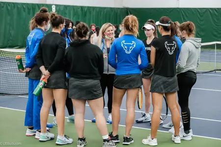 Coach Maines speaks to the team.