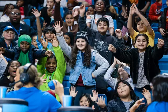 Students from Western New York cheer on UB Women's Basketball against Bowling Green.