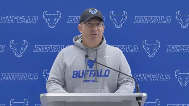 Pete Lembo Speaking at a podium