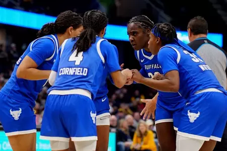 MAC Tournament Semifinal Huddle
