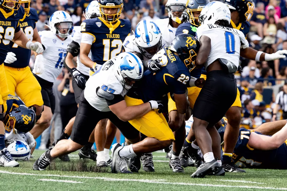 Chris Climes tackling a Toledo running back