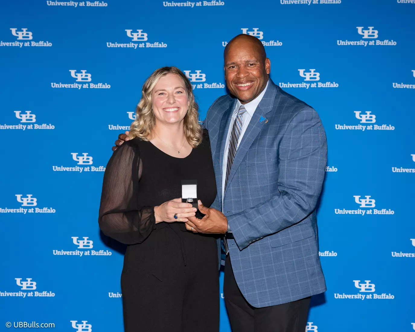 2026 Dr and Mrs Edmond J Gicewicz Family UB Athletics Hall of Fame Inductee Jackie Hall (Soccer) with UB Vice President and Director of Athletics Mark Alnutt