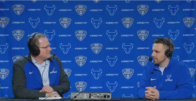 Paul Peck speaking with Brian Dougherty