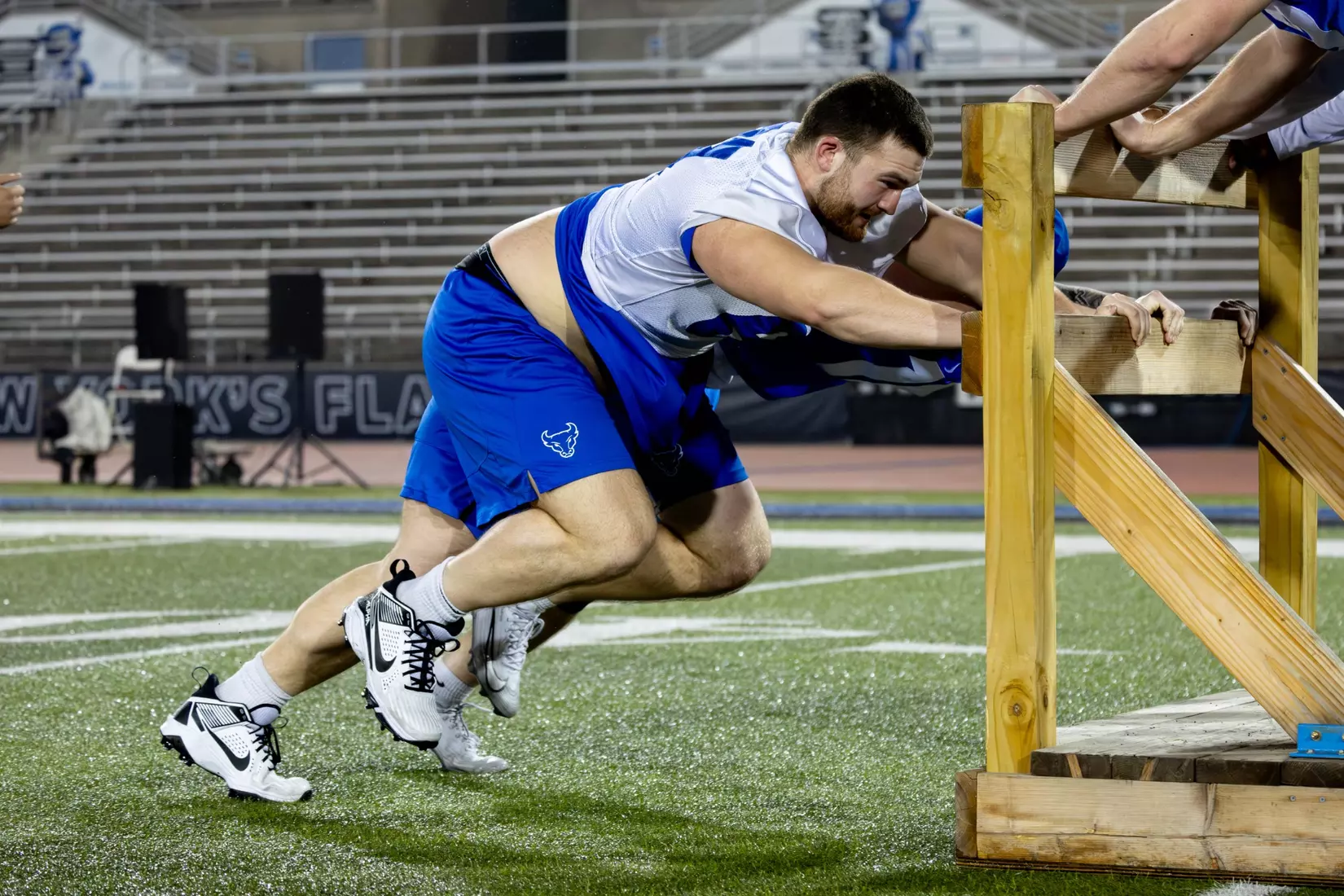 Player pushing a sled