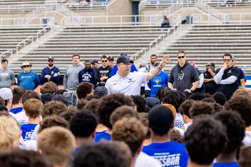 Head Coach Pete Lembo addressing players at a camp