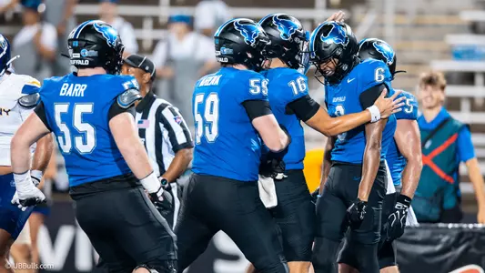 MORROW CELEBRATES HIS TOUCHDOWN CATCH