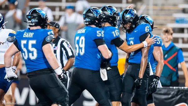 MORROW CELEBRATES HIS TOUCHDOWN CATCH