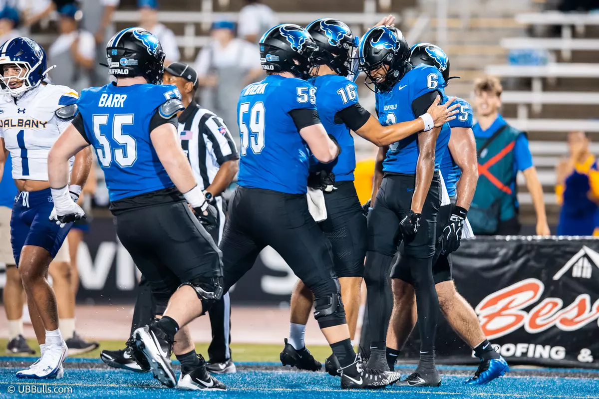 MORROW CELEBRATES HIS TOUCHDOWN CATCH