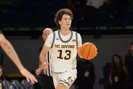 Derin Saran is dribbling up court in an exhibition game vs. Arizona State