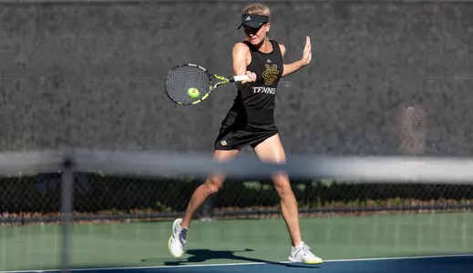 Quin Brady hits a forehand