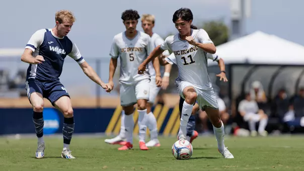 Gage Lyons dribbles through the defense in a 2026 exhibition match