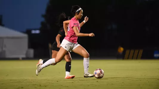 Mimi Yamamoto rushes by her defender in a 2026 match vs. CSUN
