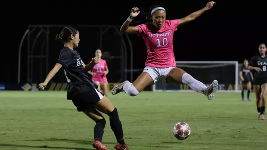 Fiona Shin leaps to avoid a pass in a 2026 match vs. Long Beach State