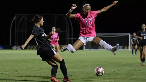 Fiona Shin leaps to avoid a pass in a 2026 match vs. Long Beach State