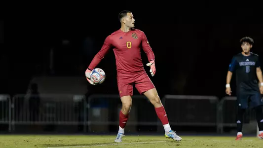 Scott Williams stands over his save in a 2026 match vs. UC Santa Barbara