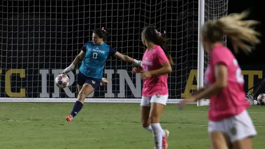Sara Paul punts ahead to her attack in a 2026 match vs. Long Beach State