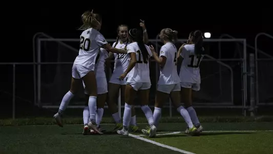 Mimi Dominguez celebrates with her teammates following her 2026 goal at UC Riverside