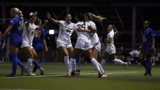 Ariane Haysman Boaler celebrates her game-winner with her teammates in a 2026 match at UC Riverside
